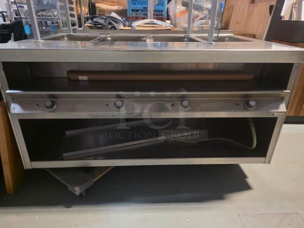 La Rosa Refrigeration L-81160 electric hot food serving counter, stainless steel, three control knobs, used condition. Sneeze guard not included.