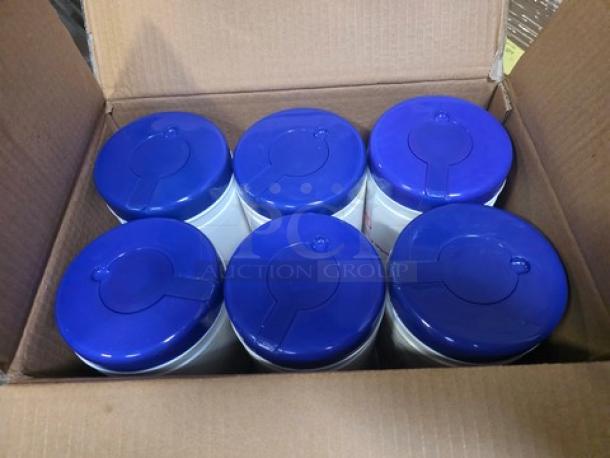 Lot of 10 boxes containing 2oz hand sanitizer bottles. Each box shows multiple bottles with blue lids, new condition.