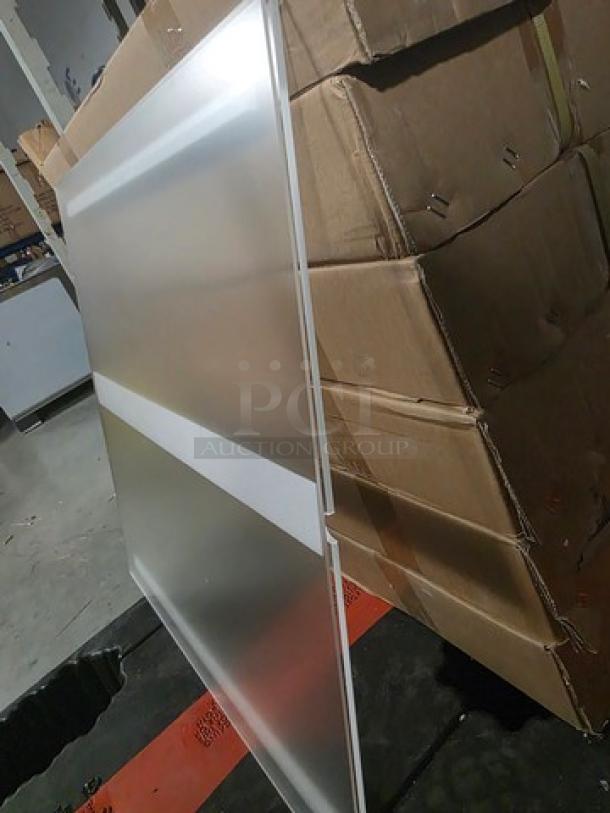 Box containing three 24"x24" clear acrylic sheets. Sheets are in new condition with protective film. Packaging shows signs of wear.