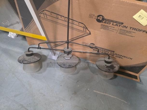 3-Light Linear Pendant Chandelier with metal frame and glass shades. Shows signs of wear. Includes ceiling mount hardware.