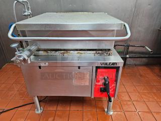 VULCAN VG30 30-Gallon gas tilting skillet, stainless steel, tilting mechanism, used condition, visible VULCAN logo on red panel.