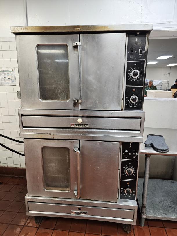 GARLAND natural gas double stack convection oven, stainless steel, tested and working, with control dials and glass doors.