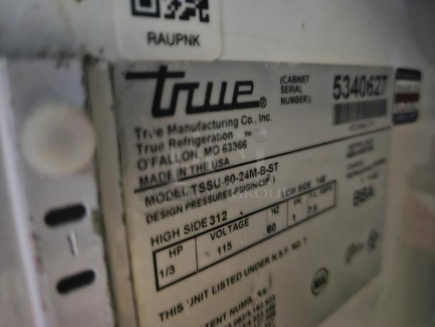 Label on True TSSU-60 two-door prep table. Shows model, serial 5340627, voltage 115, made in USA. Tested and working.