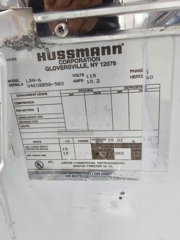 HUSSMANN LBN-6 Freezer Display Case label showing model, voltage 115V, phase 1, and UL certification.