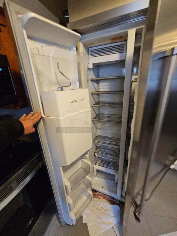 KitchenAid residential refrigerator, tested and working, ice maker not functional. Interior shelves visible, moderate wear.