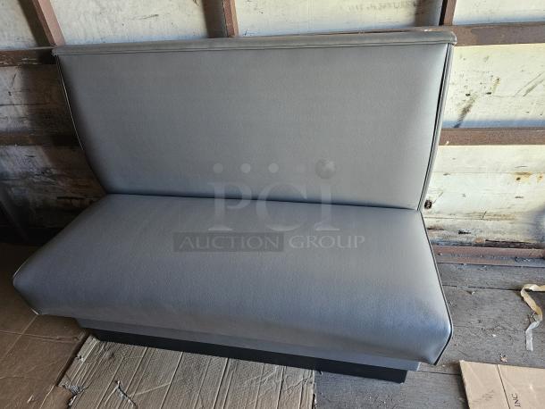 Gray Single Booth BIDX2, leather-like upholstery, in good condition, ideal for commercial or dining use.