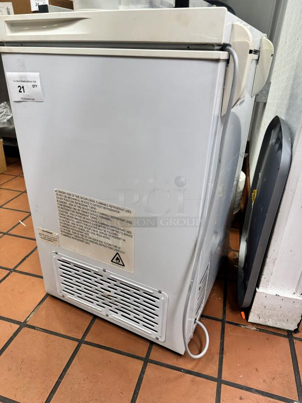 Black+Decker Chest Freezer BCFK356, white exterior, visible warning label, rear ventilation, gently used condition.