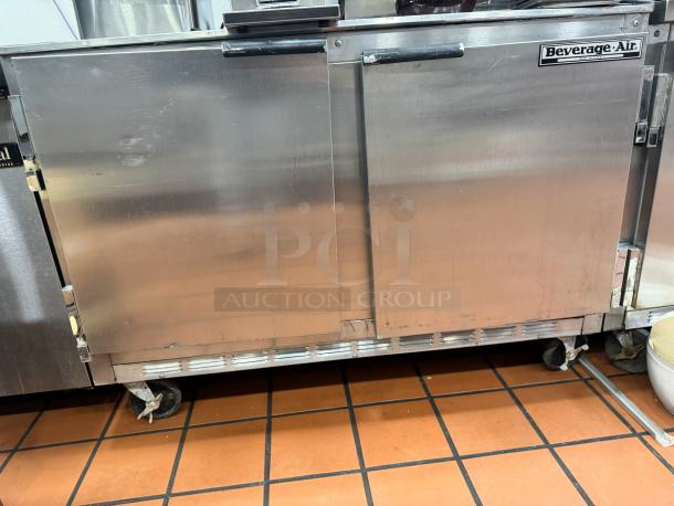 Beverage-Air 48" two-door undercounter refrigerator, stainless steel, tested and working, visible wear, on castors.