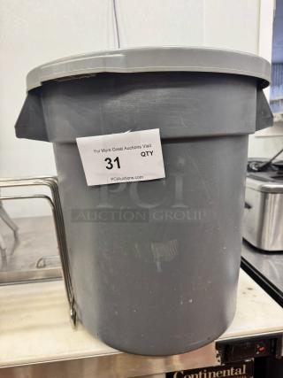 Small gray plastic trash can with lid, showing light wear. Auction label with "31 QTY" visible.