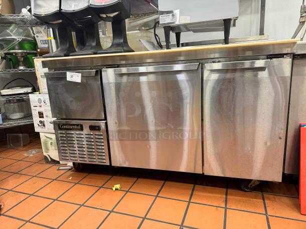 Continental 68" pizza prep-table with overhead shelf, stainless steel finish, tested and working, excellent condition.