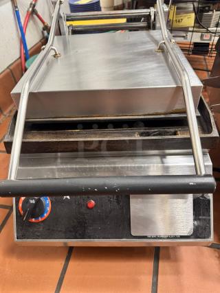 Star Pro-Max Panini Grill, stainless steel, used condition with control dial, red indicator light, and patent number visible.