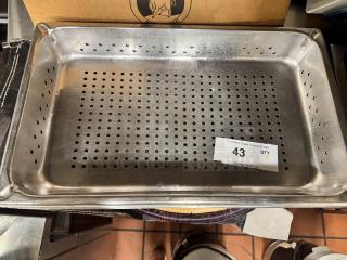 Stainless steel full-size perforated steam pan, marked BIDX7, in good condition; auction label with number 43 attached.