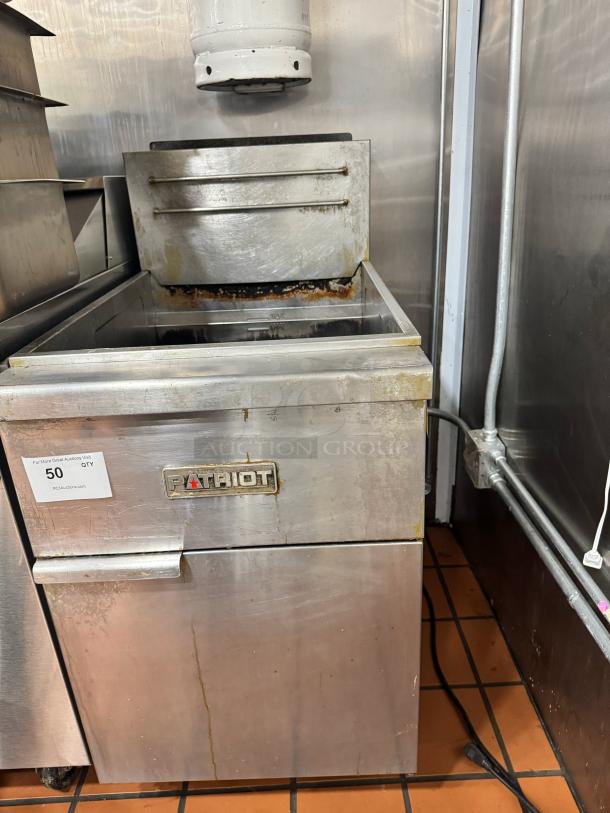 Patriot Natural Gas 40 lb Deep Fryer, stainless steel, visible wear, clear Patriot logo, auction tag reading "50 QTY."