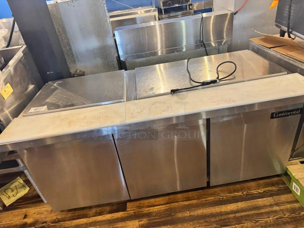 Continental SW72-30M prep table, 3-door, stainless steel, one broken handle, tested and working, visible branding.