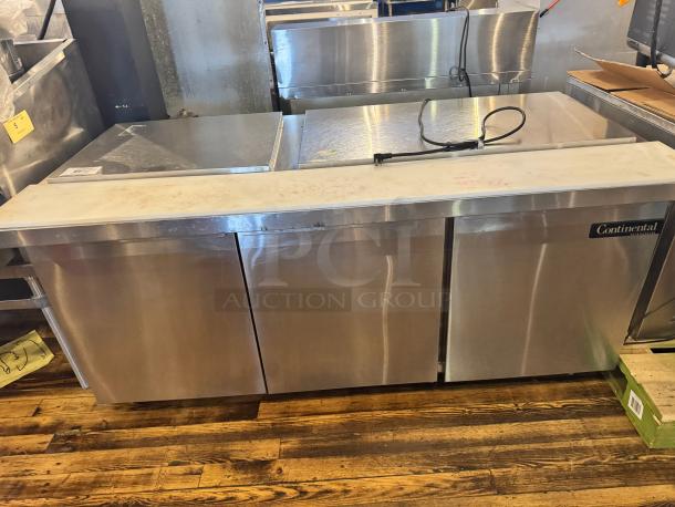 Continental SW72-30M 3-door prep table, stainless steel, one broken handle, tested and working, brand label visible.