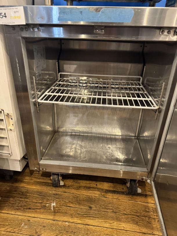 AVATCO undercounter refrigerator, model 178TUC27F, stainless steel, single shelf, tested and working, on casters.
