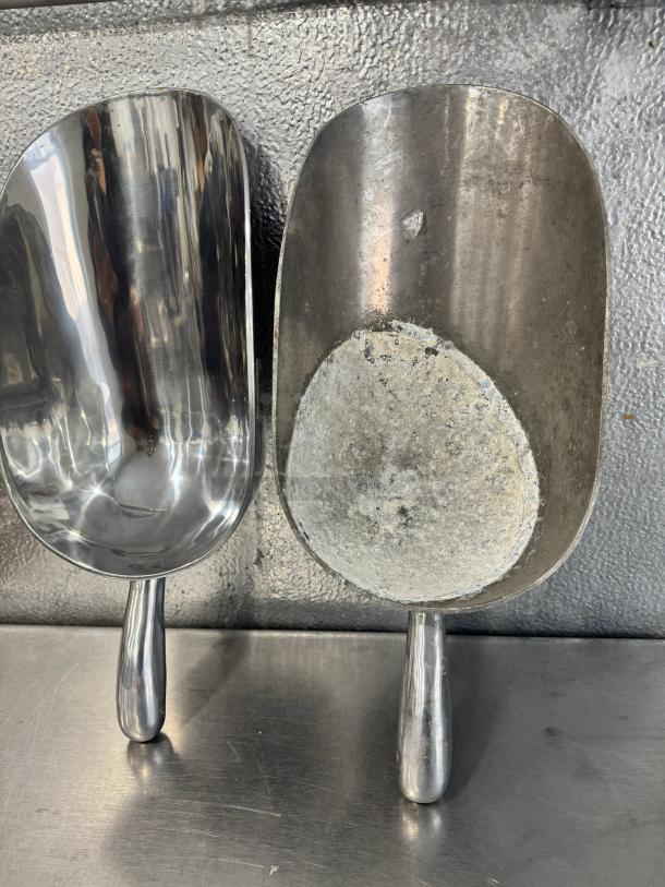 Lot of 2 aluminum scoops, 85oz each, one polished, one worn. Ideal for bulk handling. Sold together.