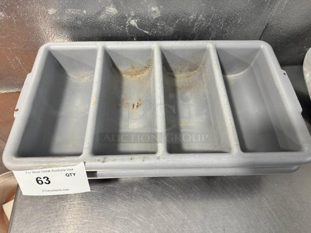 Lot of 2 gray plastic cutlery bins with four compartments each, showing signs of wear and discoloration.