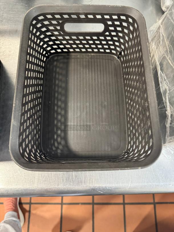 Lot of 4 small black plastic weave bins, rectangular with handles, in good condition. Ideal for organizing.