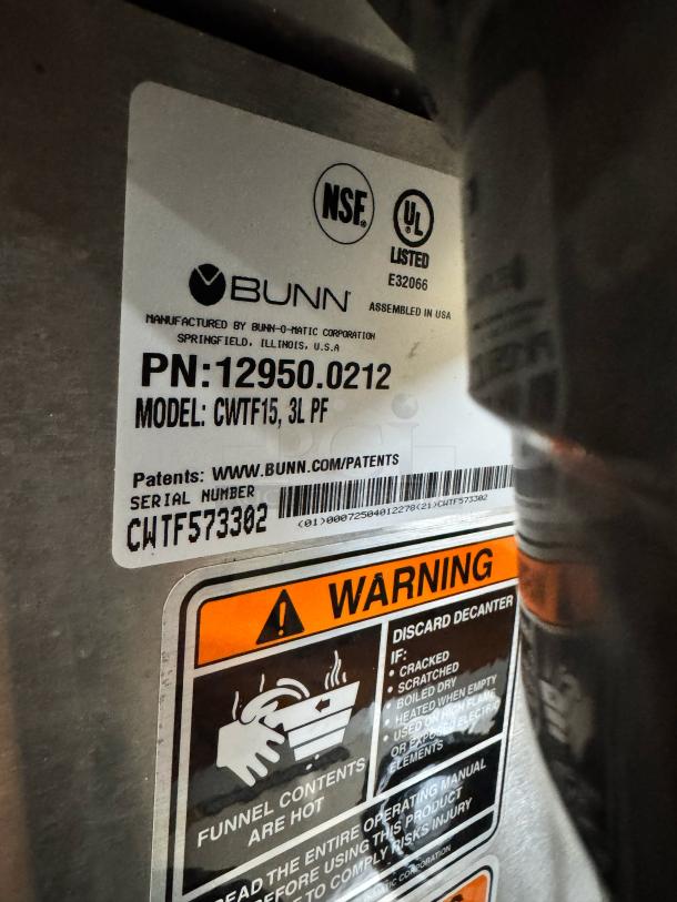 BUNN Coffee Brewer CWTF15, features 3 lower warmers, hot water faucet. NSF, UL listed. Serial: CWTF573302.