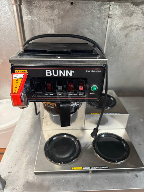 BUNN CWTF15 coffee brewer with 3 warmers and hot water faucet, used, featuring control panel and caution labels.