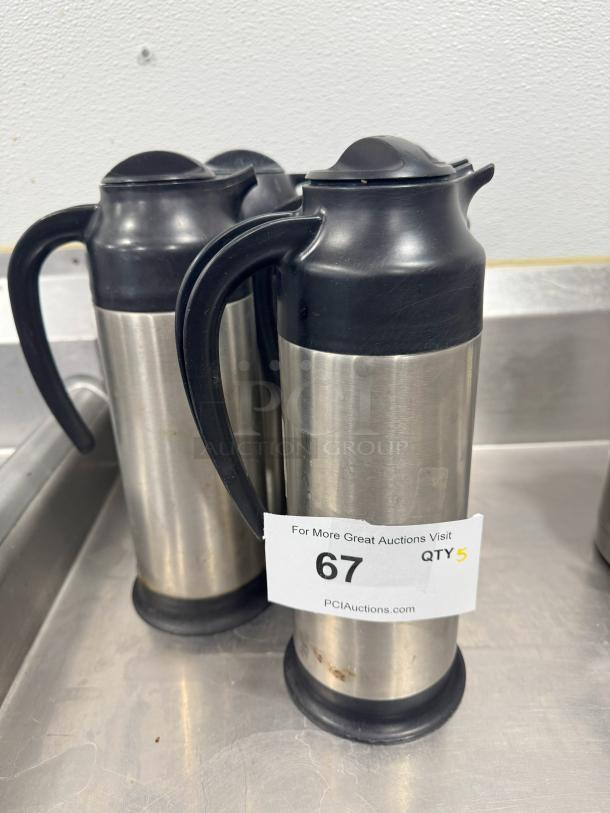 Stainless Steel Cream Server BIDX5, black lid and handle, good condition, auction label "67, QTY 5", PCI Auctions.