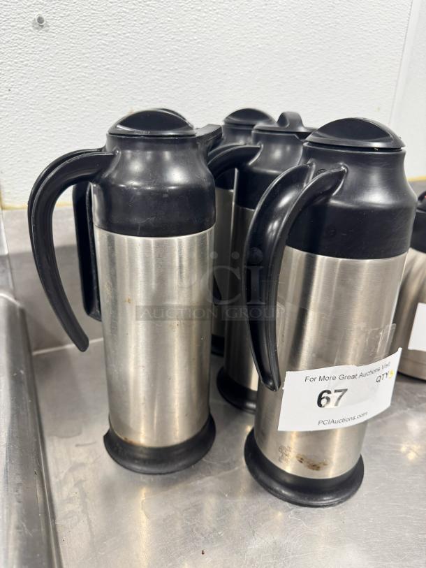 Stainless Steel Cream Server BIDX5, black lid and handle, minor wear. Auction label with bid number 67 visible.