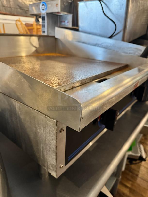 Star Max 24" natural gas commercial griddle, stainless steel, slightly used condition, smooth cooking surface.