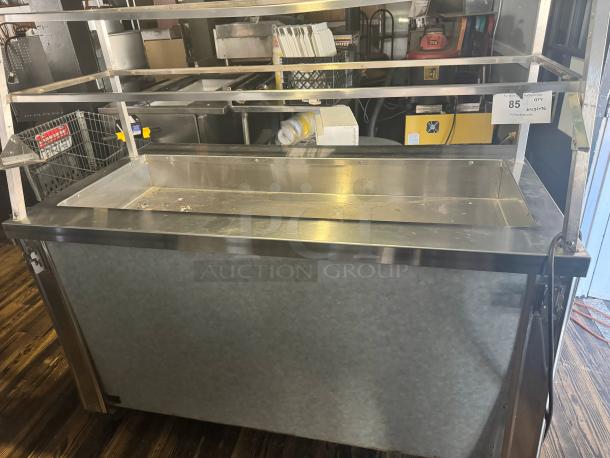 DUKE 60" Salad Bar, Model TCM-60SS, stainless steel, tested and working, good condition, visible auction tag and serial number.