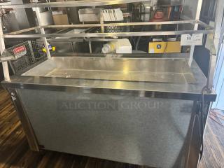 DUKE 60" Salad Bar, Model TCM-60SS, stainless steel, tested and working, good condition, visible auction tag and serial number.