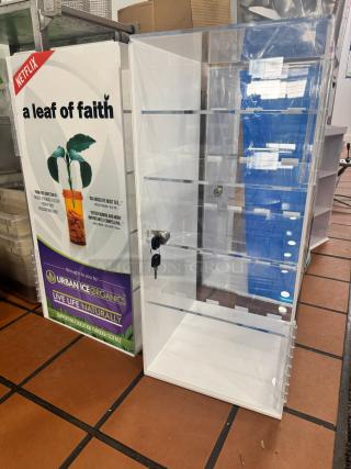 Acrylic Display Cabinet BIDX3 with shelves and lock, clear finish, excellent condition, ideal for showcasing items.
