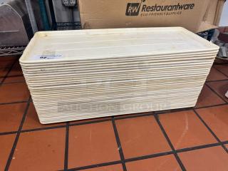 Long plastic display tray, model BIDX32, stacked and ribbed design. Shows moderate wear, labeled "92" for auction.