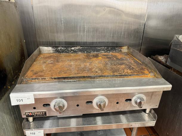 PATRIOT PLATINUM 36" natural gas griddle, worn surface, stainless steel, three control knobs, stand not included.