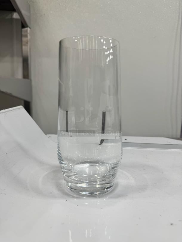 Clear highball glass BIDX19, cylindrical shape, in excellent condition, with smooth polished surface. Ideal for beverages.