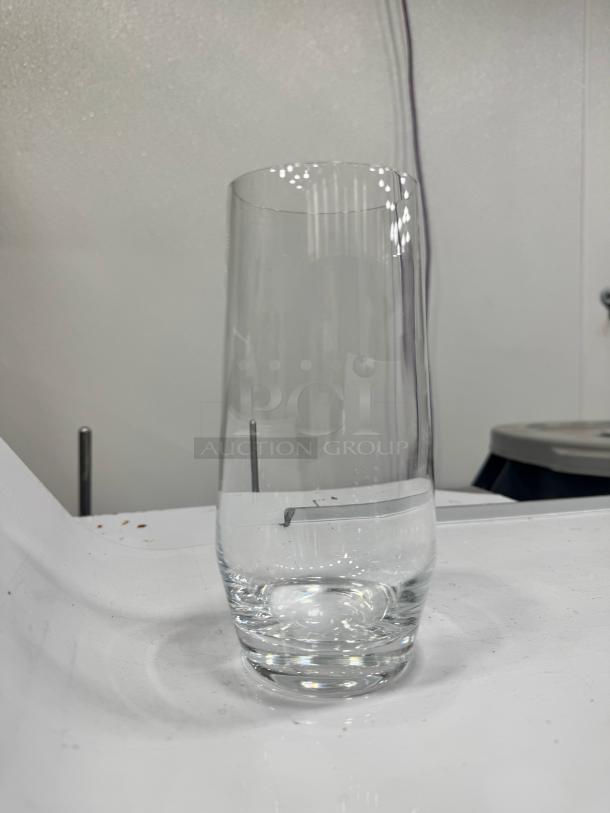 Clear highball glass BIDX19, tall and slender, in excellent condition. Perfect for cocktails.