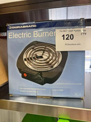 DURABRAND Electric Single Burner, model SBS110-B, new in box. Features adjustable temperature control, compact design.