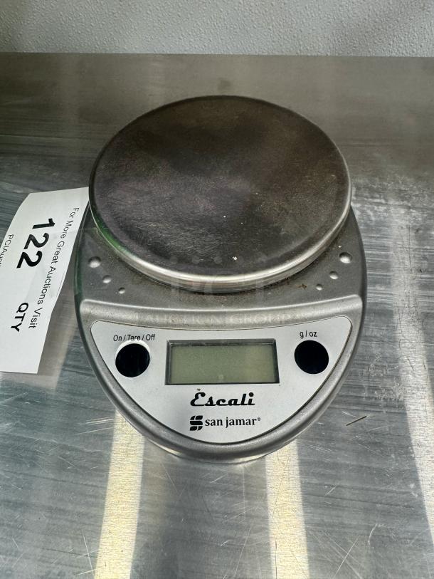 San Jamar digital scale, silver, with LCD display, tare function, g/oz measurement. Used condition, Escali branding visible.