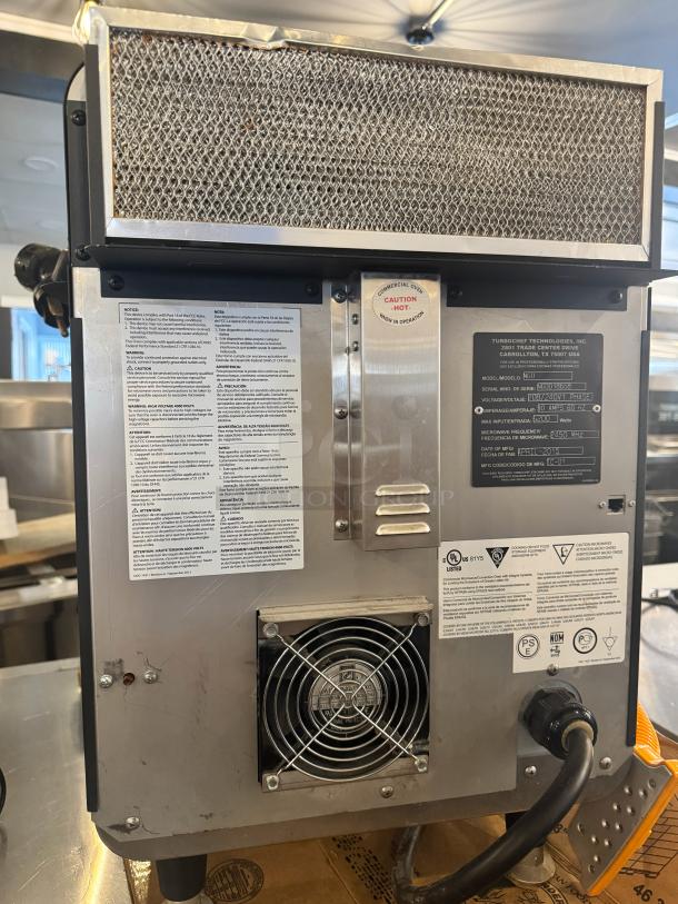 TurboChef Sota NGO high-speed countertop oven, 208/240V, stainless steel, caution label, visible vents, power cord attached.