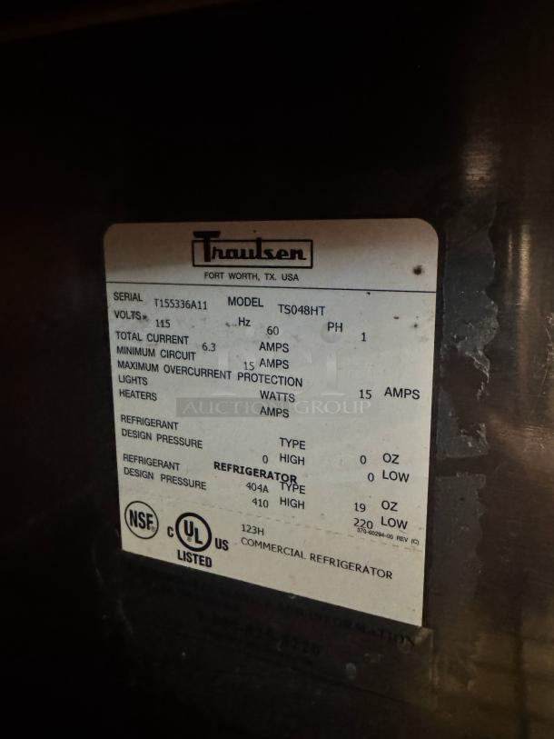Traulsen 48" Pizza Prep-Table label, Model TS048HT. Displays serial T155336A11, voltage, current, and refrigerant details.
