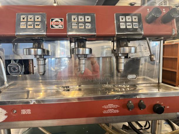 Brasilia 205EX FNC DIG 3 Espresso machine, three-group, red and silver, used, with labeled control buttons for beverage options.