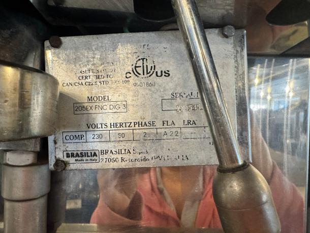 BRASILIA 205EX FNC DIG 3 espresso machine label showing model details; stainless steel body; good condition.