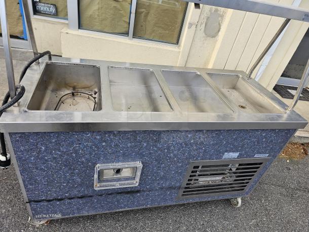 Duke drop-in hot/cold food well unit, Model HB4-1H/3C, 115V, stainless steel, used condition. Features four wells, blue exterior panel.