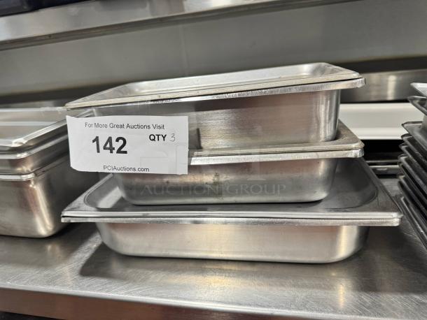 Lot of 3 stainless steel food pans with lids, auction tag showing quantity 3.