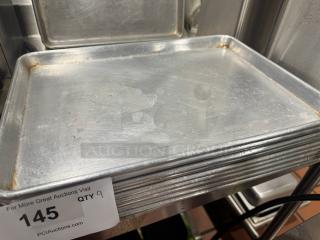 Half size baking pan, model BIDX9, showing moderate wear, with visible stacking marks, labeled as part of lot 145, quantity 9.