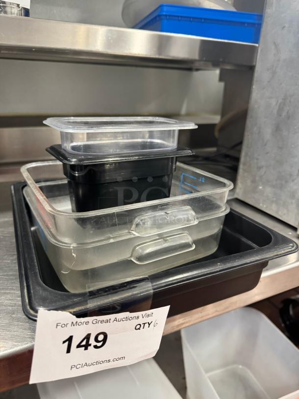Lot of 6 plastic food pans, various sizes, clear with black bases, mild scratches, auction label indicates quantity and site.