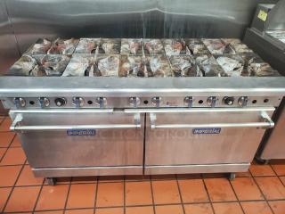 Imperial NG 10 burner stove with 2 ovens, stainless steel, used condition, features Imperial branding, visible knobs.