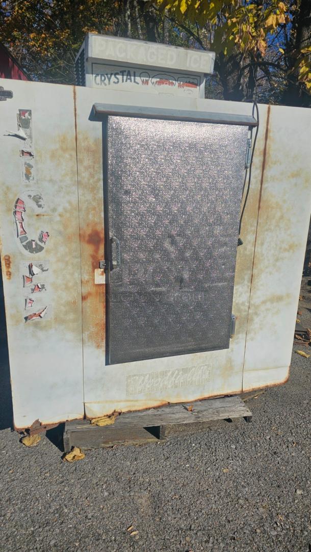 Commercial outdoor ice merchandiser, used condition with rust and faded decals, tested and working.