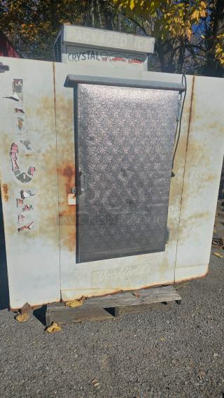Commercial outdoor ice merchandiser, used condition with rust and faded decals, tested and working.