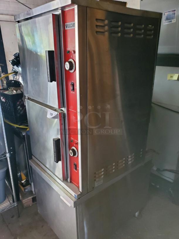 Vulcan VSX10EC commercial convection steamer, 208V 3-phase, stainless steel, dual doors, in used condition, model label visible.