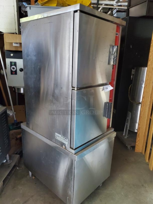 Vulcan NG commercial convection steamer, model VSX10EC, 208V/3PHASE, stainless steel, dual doors, visible control panel, good condition.